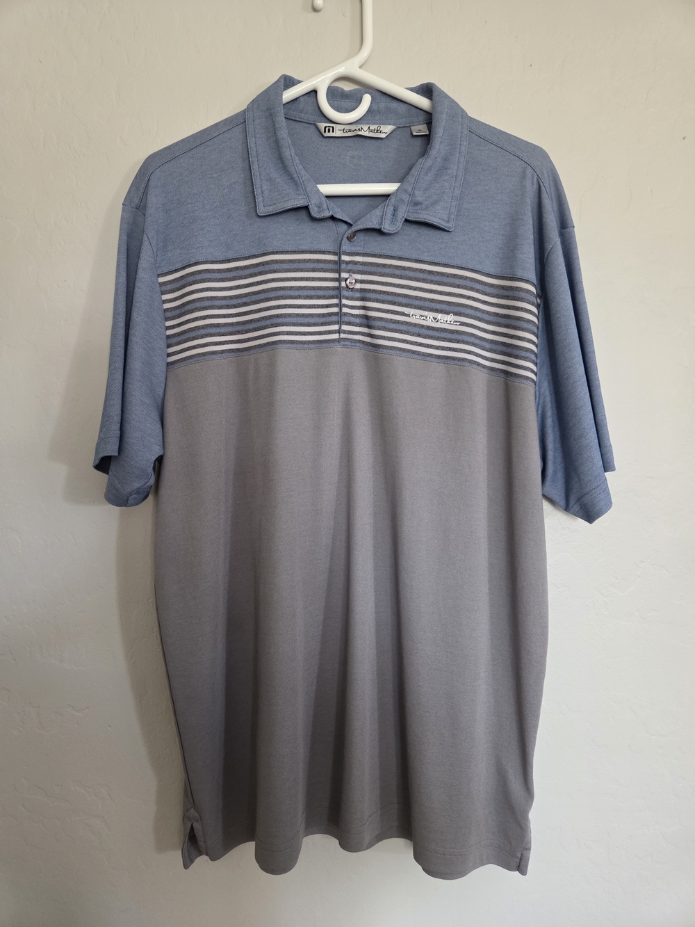 Travis Mathew Light Blue and Gray Striped Chest Polo